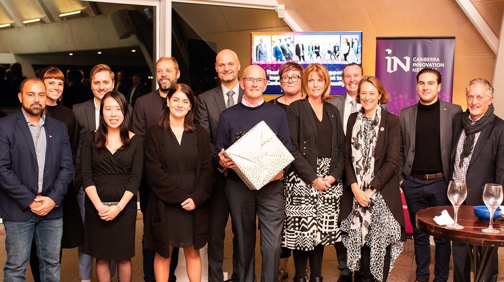 Canberra Innovation Network advisers and board members giving Tony his gift