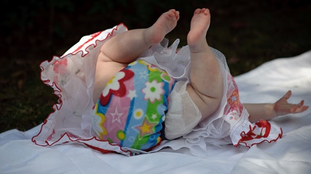Baby wearing Krap Katchers