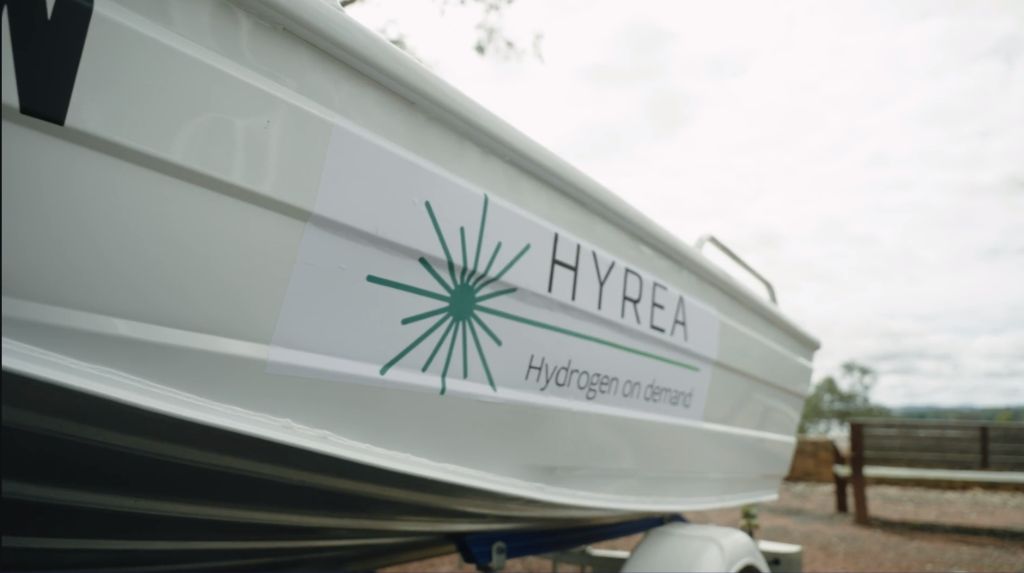 HYREA side of boat with logo